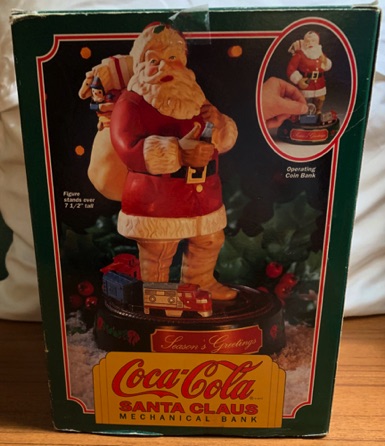 4408-1 € 50,00 coca cola kerstman tevens spaarpot geld sparen is geluid maken.jpeg